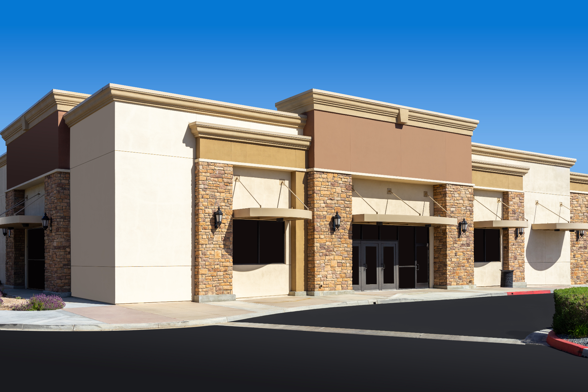 Retail center facade representing neighborhood commercial property